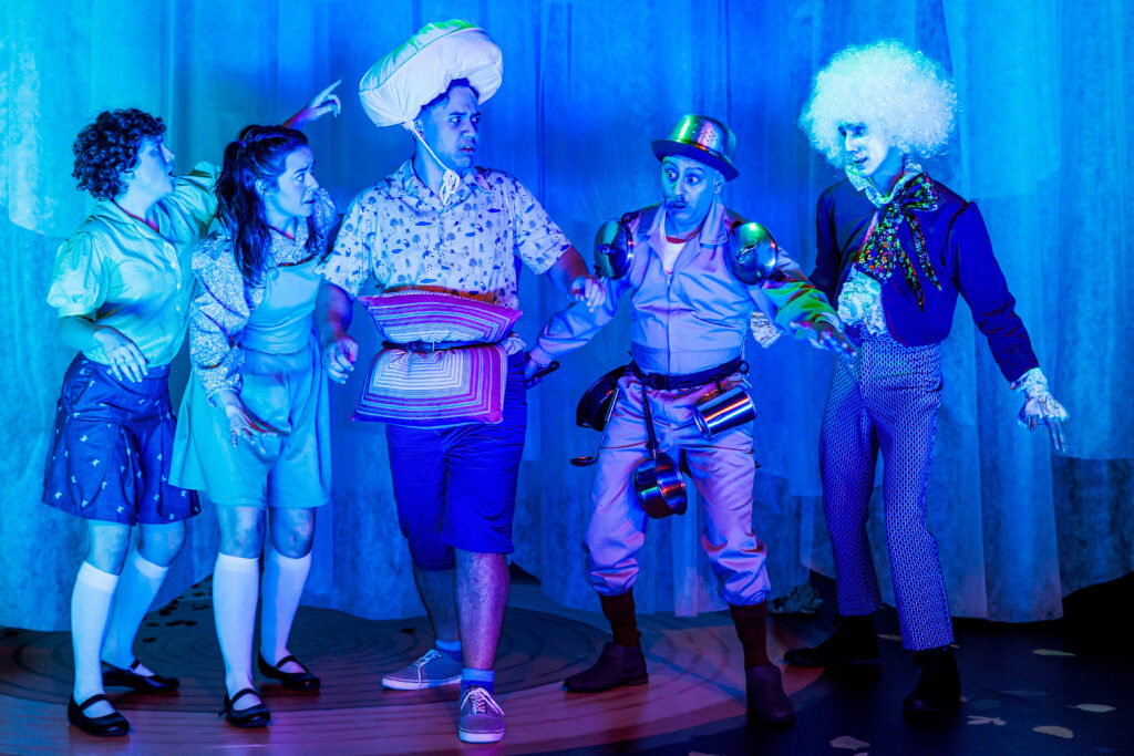 Five actors from the Magic Faraway Tree Show blue lighting
